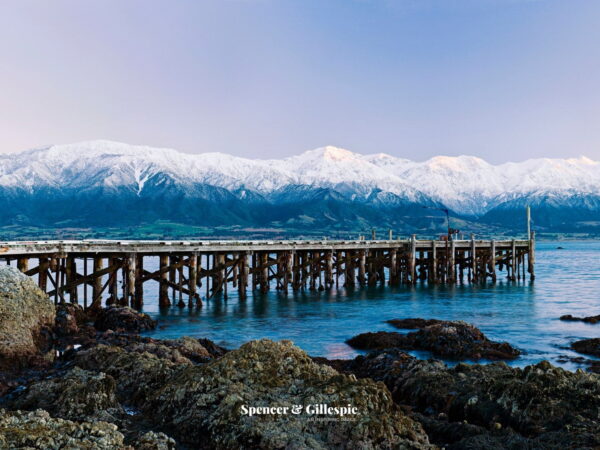 Snowy mountains and pier in New Zealand