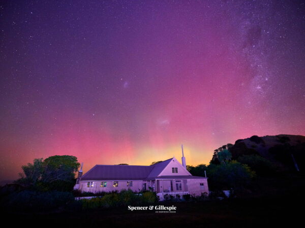 Aurora over Fyffe house in New Zealand night sky.