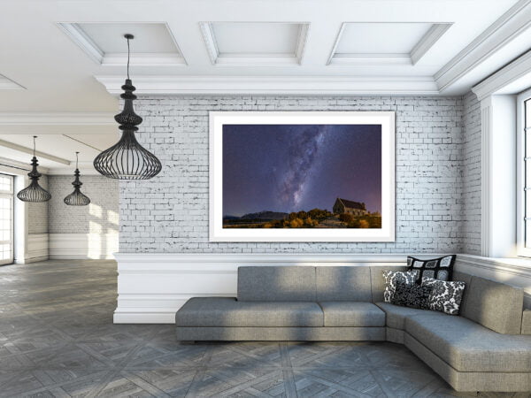 Modern living room with starry night painting.