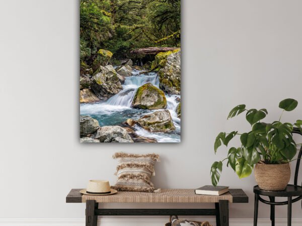 Bathroom with nature scenery poster on the wall.
