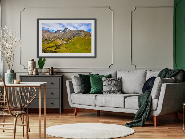 Cosy living room with mountain painting.