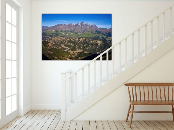 Mountain landscape photo above staircase.
