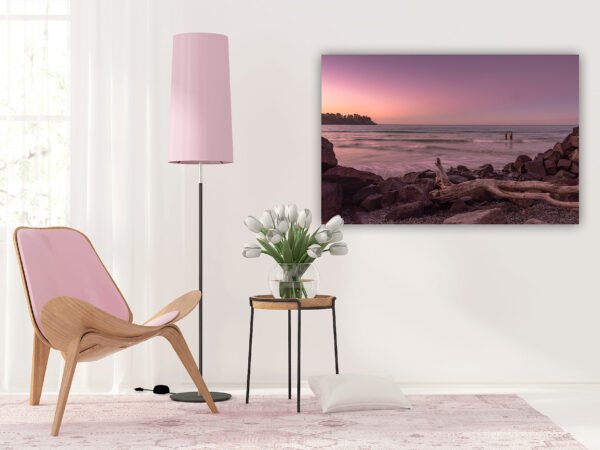 Modern lounge with beach sunset painting.