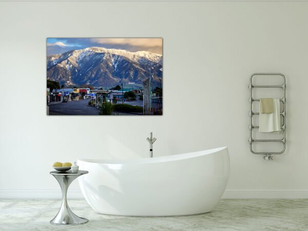 Bathroom with mountain picture on wall