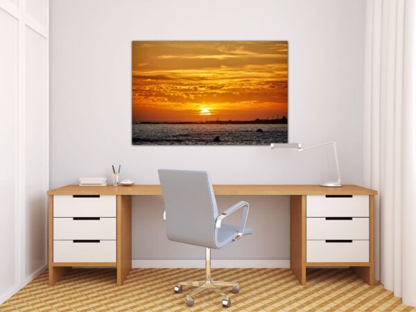 Office with sunrise photo on wall