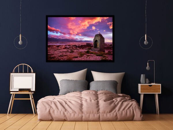 Cosy bedroom with wall art and lamps