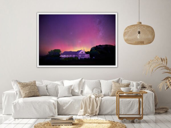 Living room with framed aurora photo