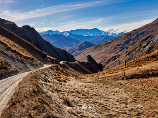 Gravel road through New Zealand mountains.