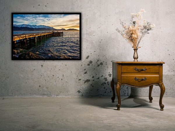 Framed pier photo, wooden table with dried flowers