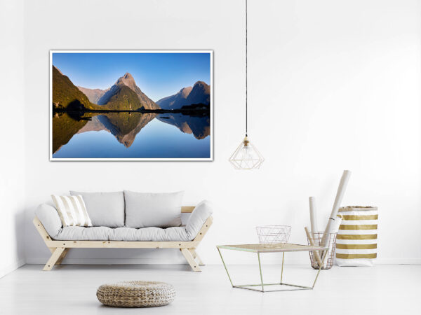 Framed mountain photo in modern white living room