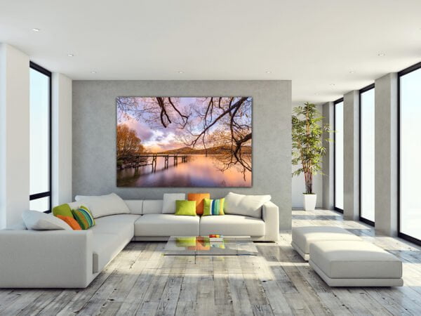 Modern living room with landscape painting.