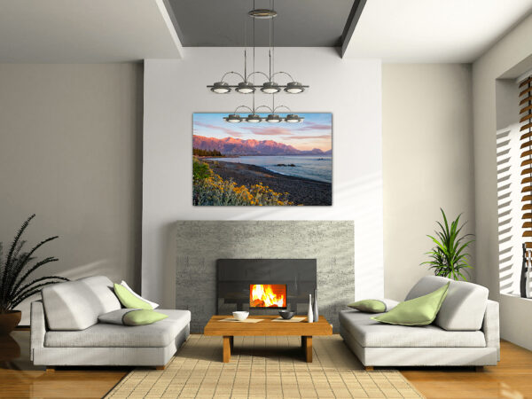 Modern lounge with fireplace and wall art.